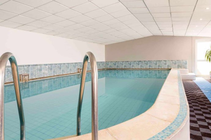 Stair access into heated indoor pool at Queens Hotel Paignton